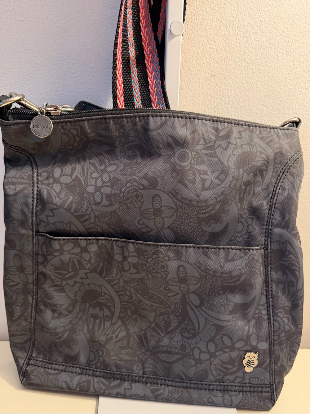 Sakroots Lucia Polyester Crossbody in the pattern “Black Spirit Desert”
